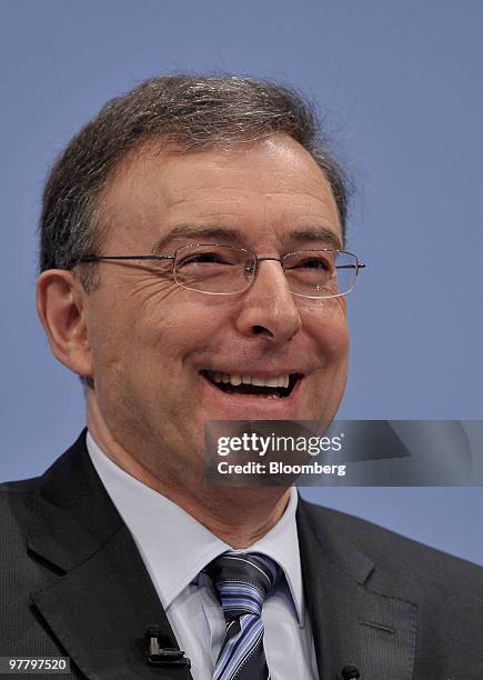 Norbert Reithofer, chief executive officer of Bayerischen Motoren Werke AG , reacts while speaking during the company's news conference in Munich,...