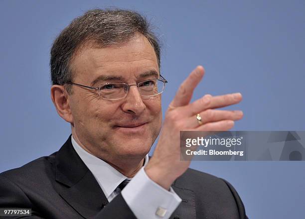Norbert Reithofer, chief executive officer of Bayerischen Motoren Werke AG , gestures while speaking during the company's news conference in Munich,...