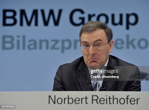 Norbert Reithofer, chief executive officer of Bayerischen Motoren Werke AG , reacts while speaking during the company's news conference in Munich,...