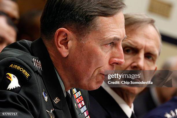 Army Gen. David Petraeus , commander of the U.S. Central Command, testifies as Navy Adm. Eric Olson, commander of the U.S. Special Operations...