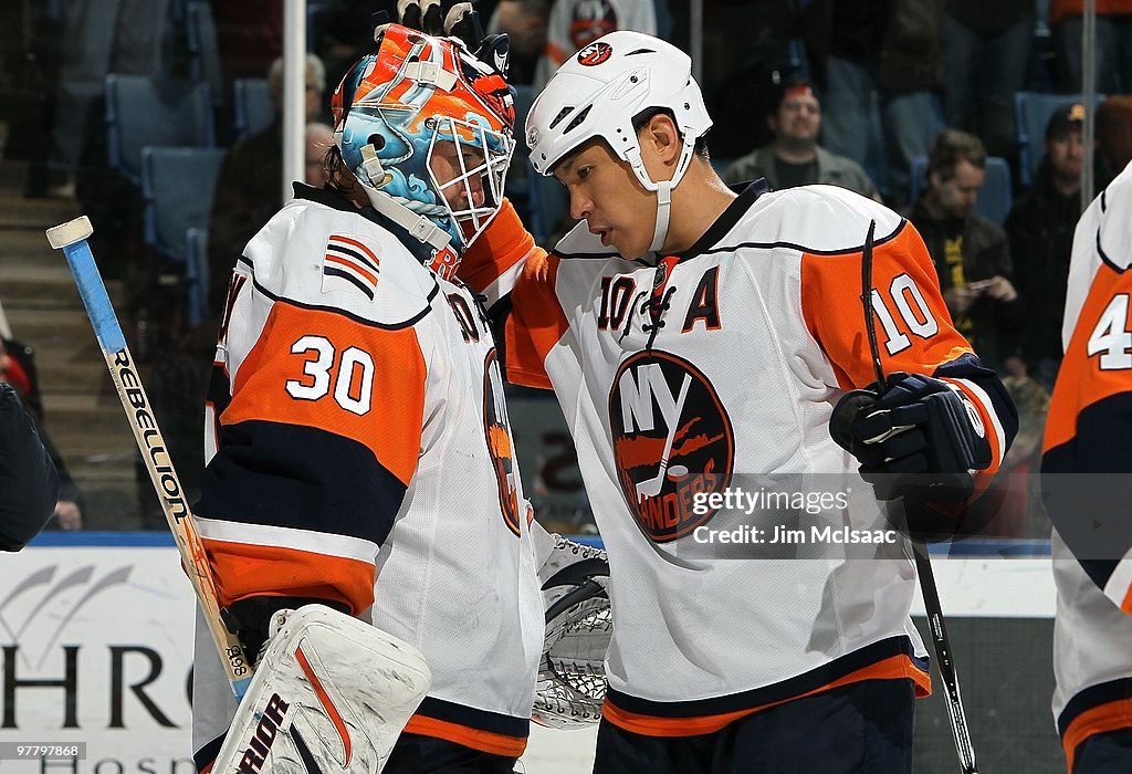 Jim Roloson Dwayne Roloson and Richard Park of the New York Islanders celebrate ...
