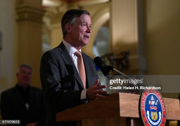 Colorado Governor John Hickenlooper speaks during a press conference inside the west foyer of the State Capitol on June 18, 2018 in Denver, Colorado...