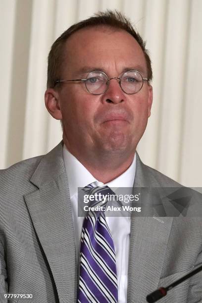 Director of the Office of Management and Budget Mick Mulvaney listens during a meeting of the National Space Council at the East Room of the White...