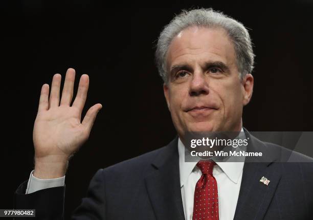 Justice Department Inspector General Michael Horowitz is sworn in prior to testimony before the Senate Judiciary Committee on Capitol Hill June 18,...