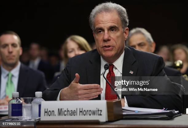 Justice Department Inspector General Michael Horowitz testifies before the Senate Judiciary Committee on Capitol Hill June 18, 2018 in Washington,...