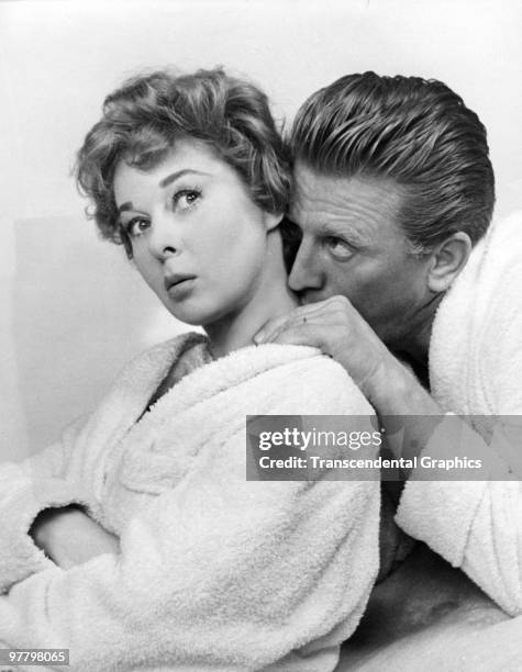 Publicity still of American actors Susan Hayward and Kirk Douglas from 'Top Secret Affair' , 1957.