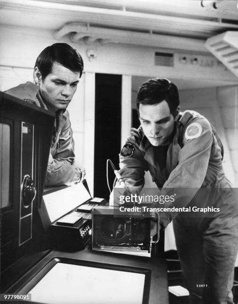 Film still of American actors Gary Lockwood and Keir Dullea in a scene from '2001: A Space Odyssey' , England, 1968.