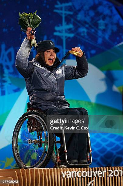 Gold medalist Alana Nichols of USA celebrates during the medal ceremony for the Women's Sitting Giant Slalom on Day 5 of the 2010 Vancouver Winter...