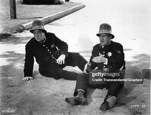 Film still of American comic actors Lou Costello and Bud Abbott in a scene from their film 'Abbott and Costello Meet the Keystone Kops , released in...