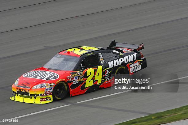 Jeff Gordon, driver of the Dupont/Cromax Pro Chevrolet, drives during practice for the NASCAR Sprint Cup Series Auto Club 500 at Auto Club Speedway...
