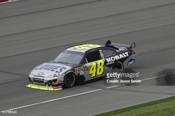 Jimmie Johnson drives the Lowe's/Kobalt Tools Chevrolet during practice for the NASCAR Sprint Cup Series Auto Club 500 at Auto Club Speedway on...