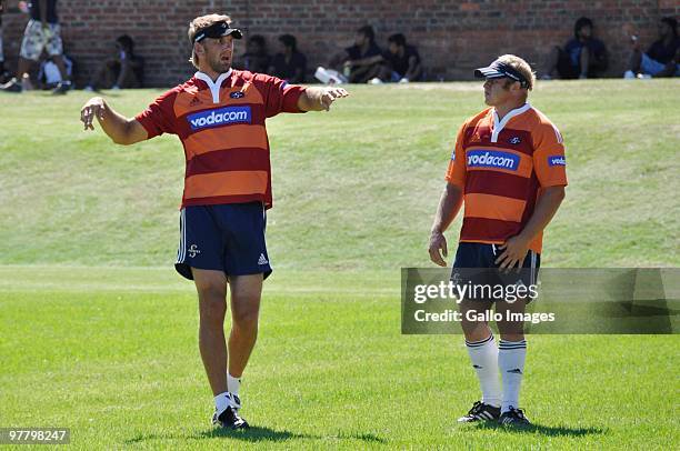 Andries Bekker chats to Brok Harris during the Stormers training session at the High Performance Centre in Bellville on March 17, 2010 in Cape Town,...