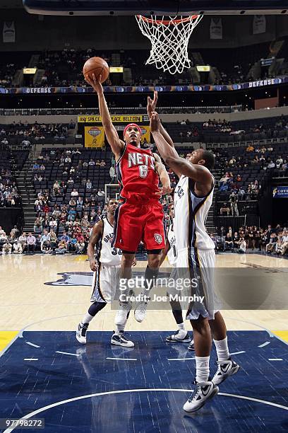 Courtney Lee of the New Jersey Nets goes to the basket against Darrell Arthur of the Memphis Grizzlies during the game on March 8, 2010 at FedExForum...