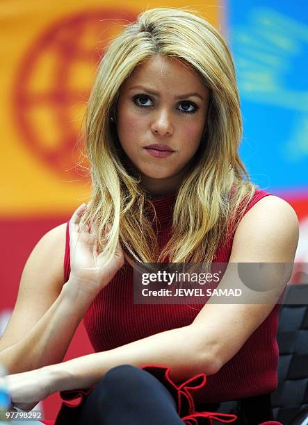 Recording artist Shakira Mebarak, founder of ALAS Foundation, listens a question during a town hall meeting at the World Bank in Washington, DC, on...