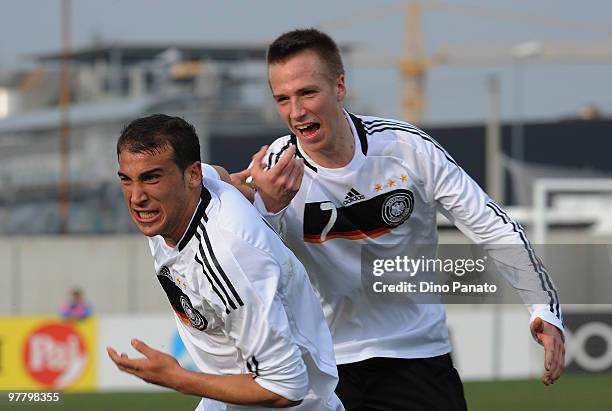 Cenk Tosun of Germany celebrates after scoring his team's first goal during the U19 International Friendly match between Italy and Germany on March...