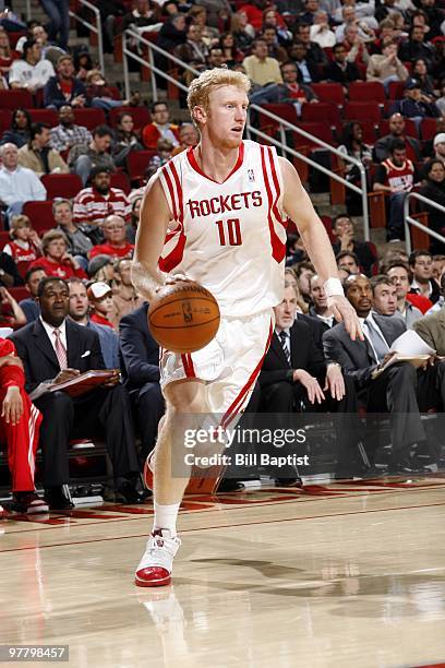 Chase Budinger of the Houston Rockets moves the ball up court during the game against the San Antonio Spurs at Toyota Center on February 26, 2010 in...