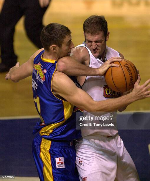 David Pennisi for Townsville fouls David Stiff for Adelaide in the match between the Adelaide 36ers and the Townsville Crocodiles played at the...