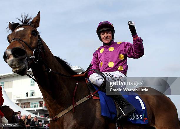 Barry Geraghty celebrates with Big Zeb after winning The Seasons Holidays Queen Mother Championship Steeple Chase on Day Two of the Cheltenham...