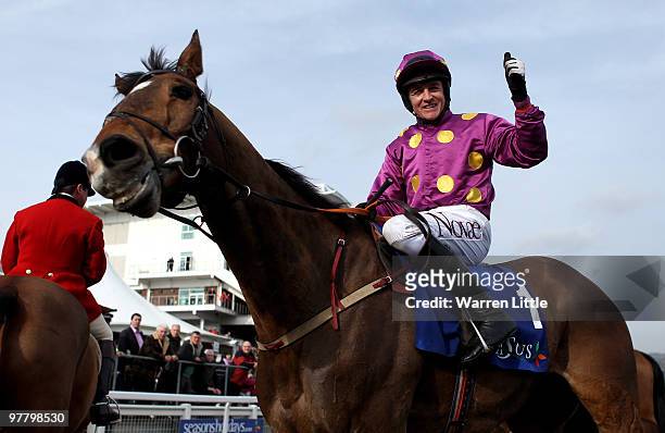 Barry Geraghty celebrates with Big Zeb after winning The Seasons Holidays Queen Mother Championship Steeple Chase on Day Two of the Cheltenham...
