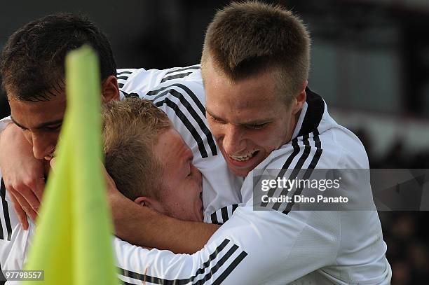 Cenk Tosun of Germany celebrates after scoring his team's first goal during the U19 International Friendly match between Italy and Germany on March...