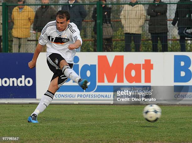 Cenk Tosun of Germany shoots at goal during the U19 International Friendly match between Italy and Germany on March 17, 2010 in Sacile, Italy.