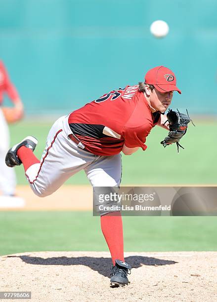 Bryan Shaw of the Arizona Diamondbacks pitches during a Spring Training game against the Cincinnati Reds on March 9, 2010 at Goodyear Ballpark in...