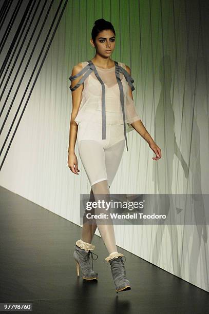Model showcases designs on the catwalk by Laura De Vries as part of L'Oreal Paris Runway 5 on the third day of the 2010 L'Oreal Melbourne Fashion...