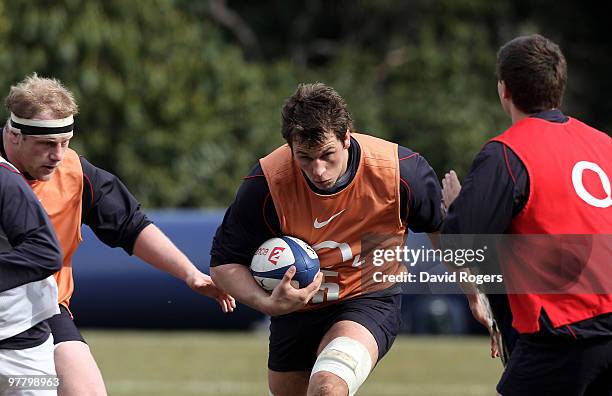 Louis Deacon runs with the ball during the England training session held at Pennyhill Park on March 17, 2010 in Bagshot, England.