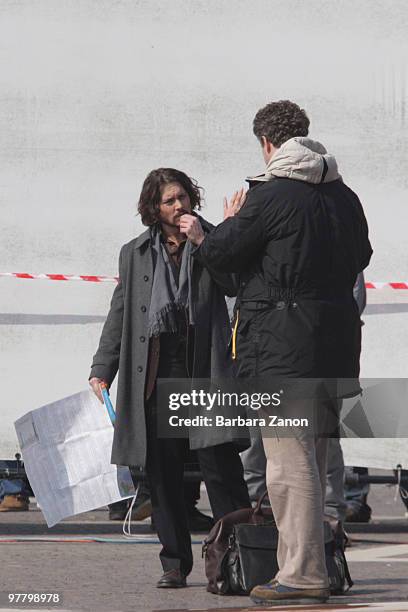 Actor Johnny Depp and director Florian Henckel von Donnersmarck are seen at the Piazzale della Stazione, filming on location for "The Tourist" on...