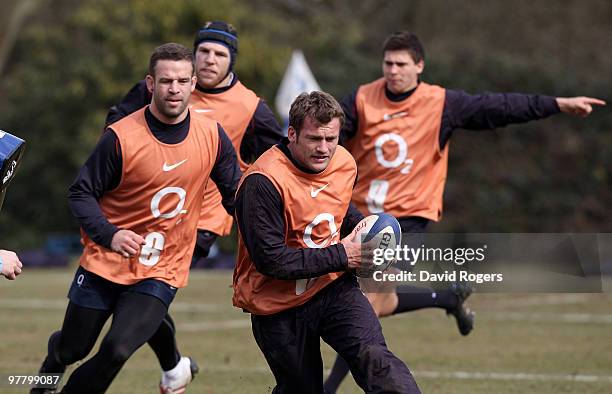 Mark Cueto runs with the ball during the England training session held at Pennyhill Park on March 17, 2010 in Bagshot, England.
