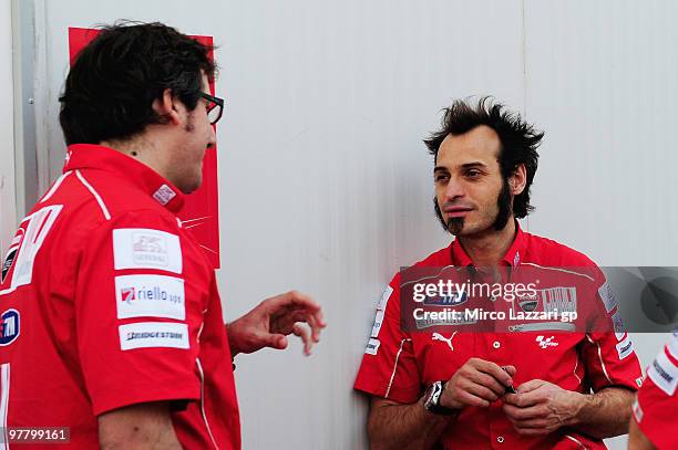 Vittoriano Guareschi of Italy and Ducati Marlboro Team speaks in paddock during the first day of testing at Losail Circuit on March 17, 2010 in Doha,...