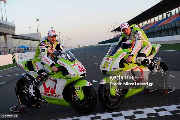Mika Kallio of Finland and Pramac Green Energy Team and Aleix Espargaro of Spain and Pramac Green Energy Team pose with the new colours of bike on...