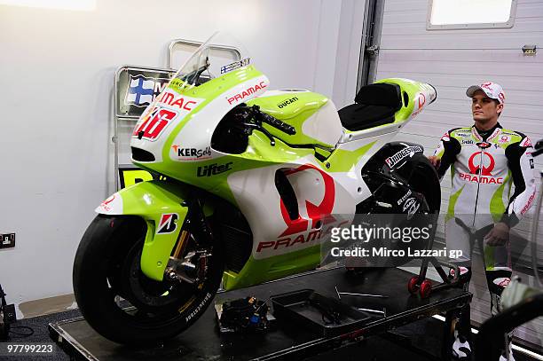 Mika Kallio of Finland and Pramac Green Energy Team looks his new bike on box during the first day of testing at Losail Circuit on March 17, 2010 in...