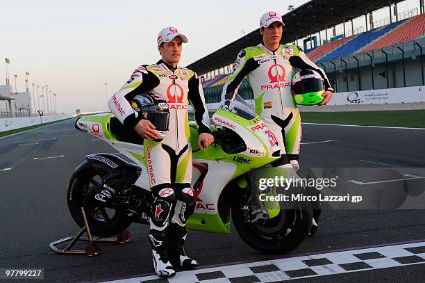 Mika Kallio of Finland and Pramac Green Energy Team and Aleix Espargaro of Spain and Pramac Green Energy Team pose with the new colours of bike on...