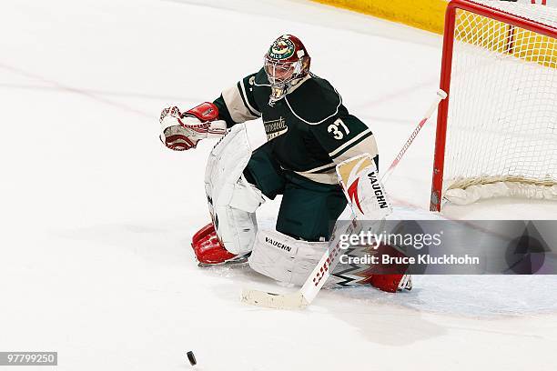 Josh Harding of the Minnesota Wild blocks a shot against the St. Louis Blues during the game at the Xcel Energy Center on March 14, 2010 in Saint...