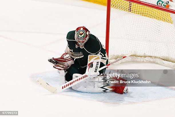 Goalie Josh Harding of the Minnesota Wild blocks a shot against the St. Louis Blues during the game at the Xcel Energy Center on March 14, 2010 in...