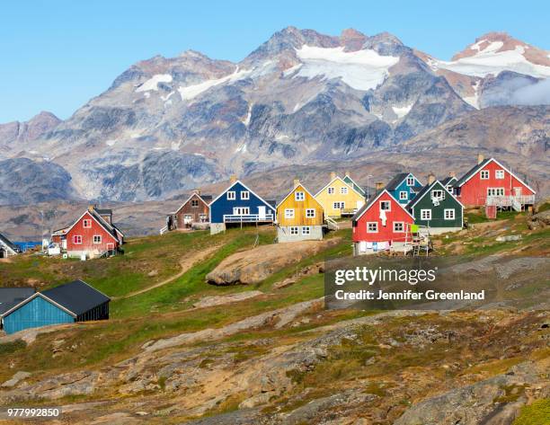 colorful houses of tasiilaq, tasiilaq, sermersooq, greenland, denmark - groenland stockfoto's en -beelden