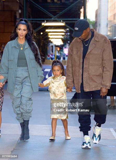 Kanye West, Kim Kardashian and daughter North West seen out and about in Manhattan on June 15, 2018 in New York City.