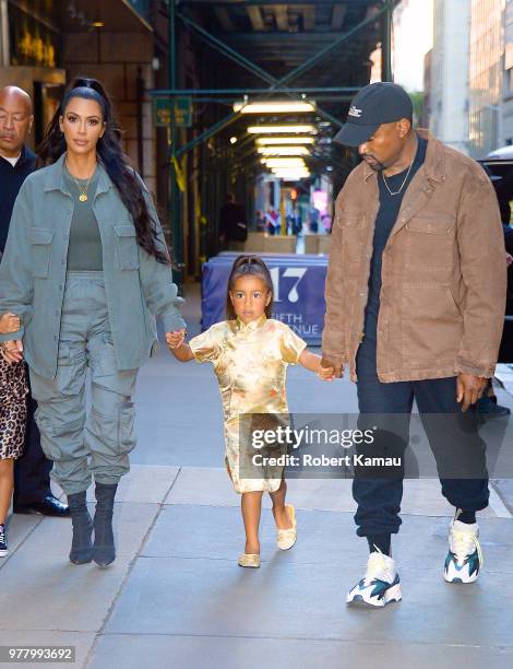 Kanye West, Kim Kardashian and daughter North West seen out and about in Manhattan on June 15, 2018 in New York City.