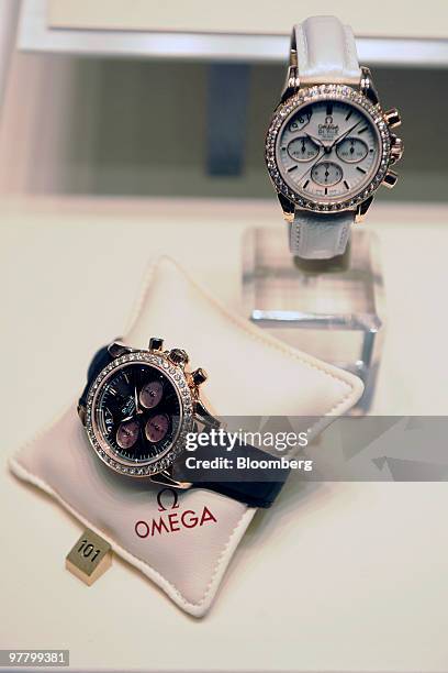 Omega watches are seen on display at the Omega stand at the Baselworld watch fair in Basel, Switzerland, on Wednesday, March 17, 2010. The Baselworld...