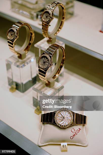 Omega watches are seen on display at the Omega stand at the Baselworld watch fair in Basel, Switzerland, on Wednesday, March 17, 2010. The Baselworld...