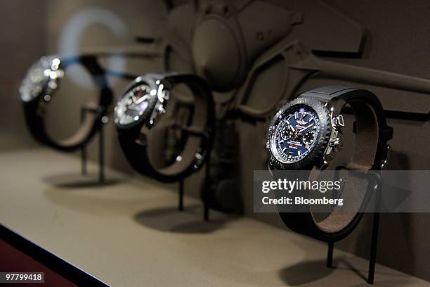 Breitling watches are seen on display at the Rado stand at the Baselworld watch fair in Basel, Switzerland, on Wednesday, March 17, 2010. The...
