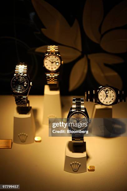 Rolex watches are seen on display at the Rolex stand at the Baselworld watch fair in Basel, Switzerland, on Wednesday, March 17, 2010. The Baselworld...