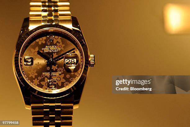 Rolex watches are seen on display at the Rolex stand at the Baselworld watch fair in Basel, Switzerland, on Wednesday, March 17, 2010. The Baselworld...