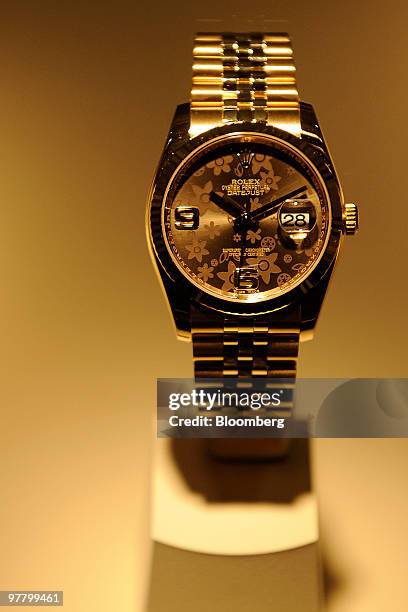 Rolex watches are seen on display at the Rolex stand at the Baselworld watch fair in Basel, Switzerland, on Wednesday, March 17, 2010. The Baselworld...