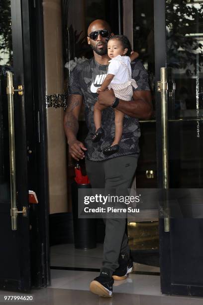 Basketball star Kobe Bryant and his daughter Bianka Bella leave their hotel on June 18, 2018 in Paris, France.