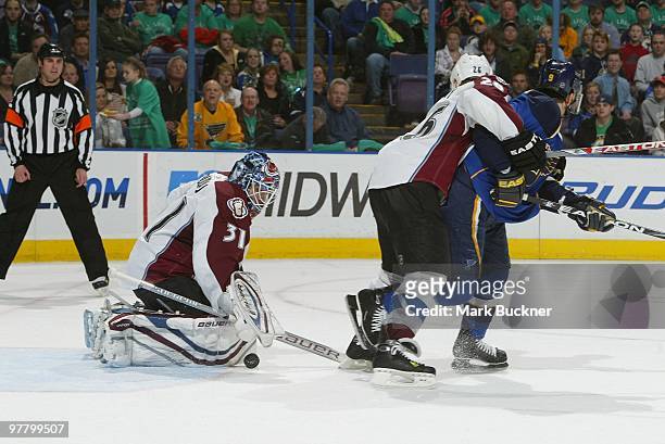 Peter Budaj of the Colorado Avalanche makes a save in the game against the St. Louis Blues on March 16, 2010 at Scottrade Center in St. Louis,...