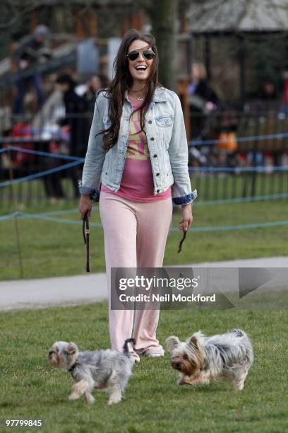 Danielle Lloyd Seen taking their new dog for a walk in Regents Park on March 17, 2010 in London, England.