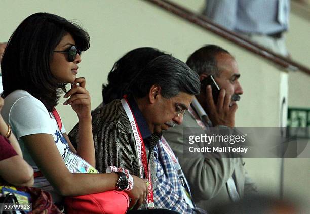 Actress Priyanka Chopra watches the action from the India Vs Argentina Hockey World Cup match at the Major Dhyan Chand national stadium in New Delhi...