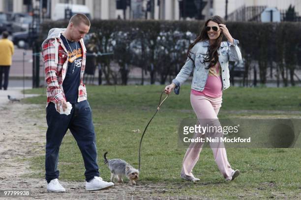 Jamie O'Hara and Danielle Lloyd Seen taking their new dog for a walk in Regents Park on March 17, 2010 in London, England.